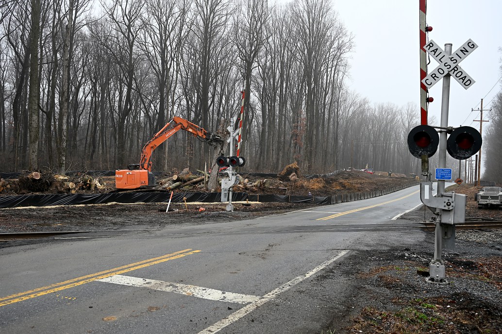 Trees cleared for data center construction near a railroad crossing in Frederick County